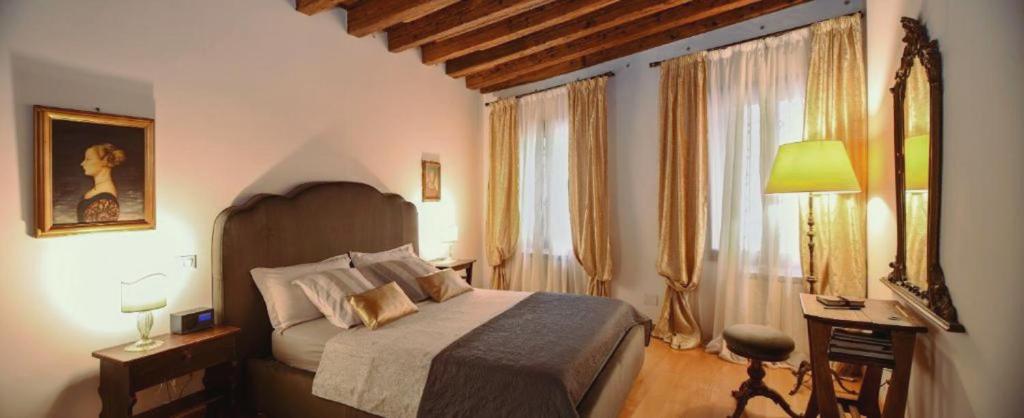 Krevet ili kreveti u jedinici u okviru objekta Leone Marciano Venice Apartment Independent and private entrance