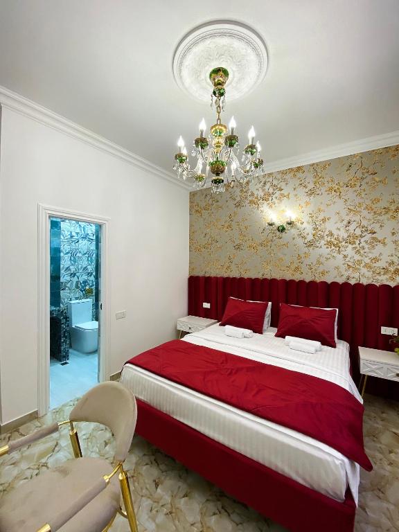 Postel nebo postele na pokoji v ubytování Shirbakyan Boutique Hotel & Apartments