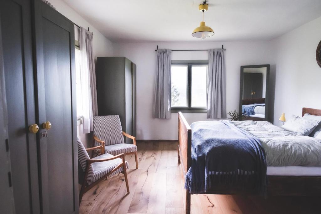 Postel nebo postele na pokoji v ubytování Chaloupka Na Gruni