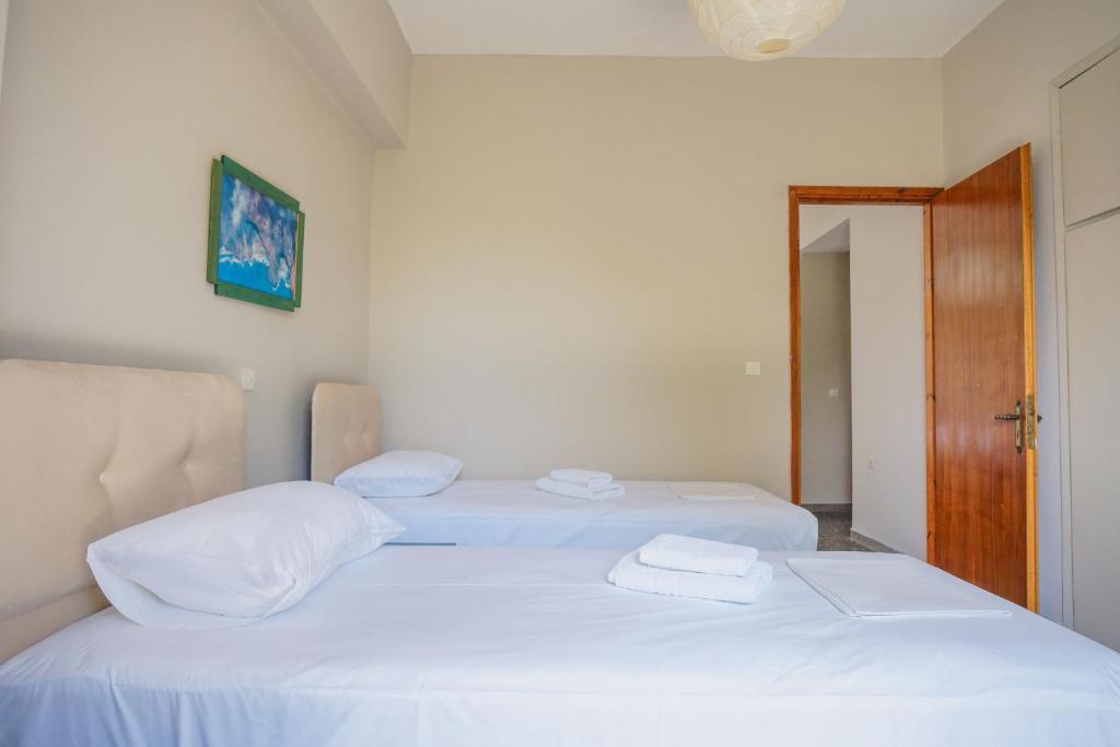 Postel nebo postele na pokoji v ubytování Hotel Korfos - Ξενοδοχείο Κόρφος Renovated
