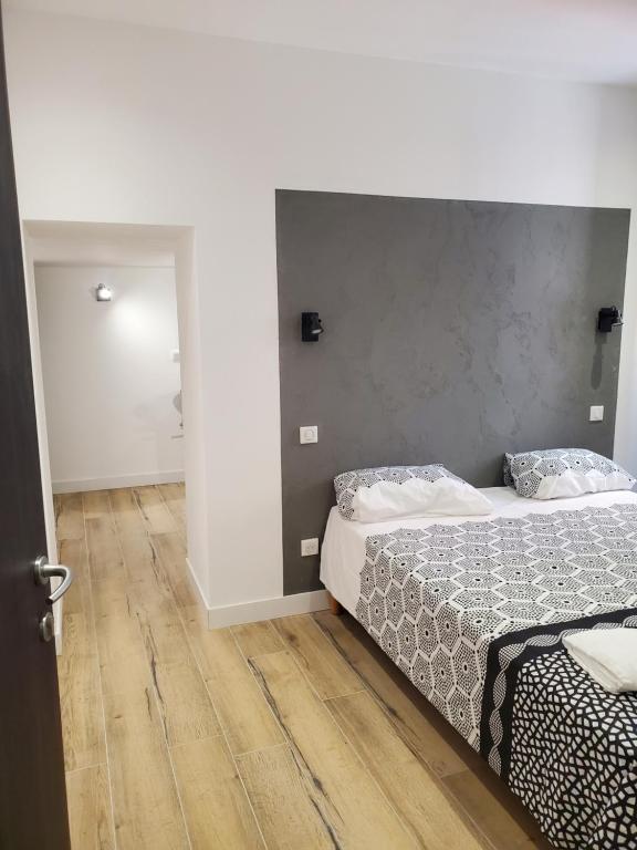 Postel nebo postele na pokoji v ubytování Chambre d'Hôte Straboni
