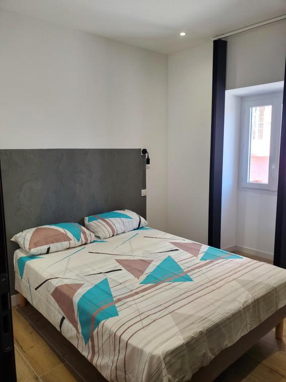 Postel nebo postele na pokoji v ubytování Chambre d'Hôte Straboni