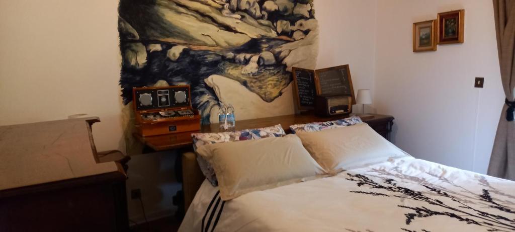 Tempat tidur dalam kamar di Al casale da Rossana