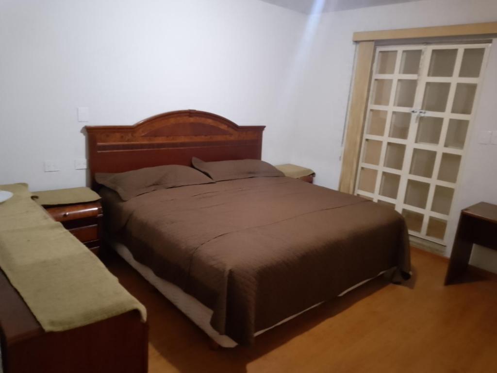 Ένα ή περισσότερα κρεβάτια σε δωμάτιο στο La Cima