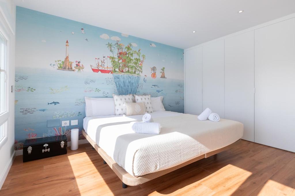 Posteľ alebo postele v izbe v ubytovaní Luxury beach/port apartment