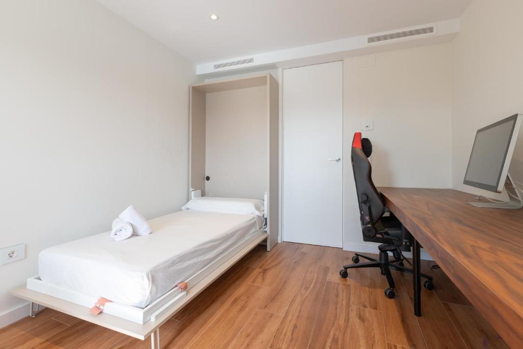 Posteľ alebo postele v izbe v ubytovaní Luxury beach/port apartment