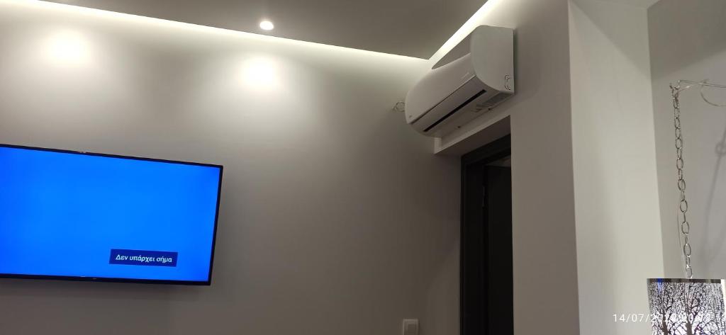 A television and/or entertainment centre at ERODIOS TOWN