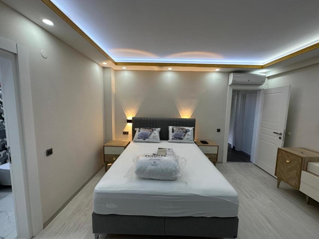 a bedroom with a large bed in a room at Villa mila in Belek