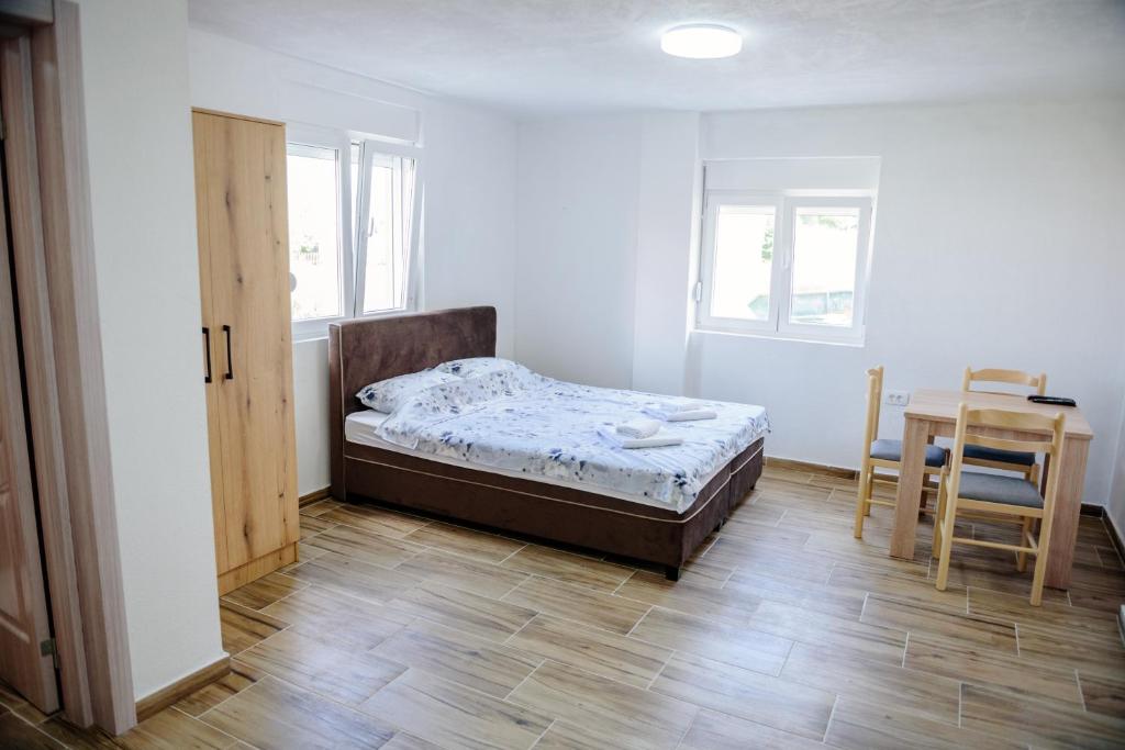 Postel nebo postele na pokoji v ubytování Premium Apartments