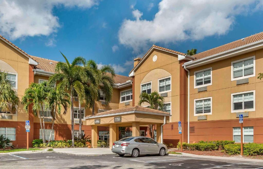a car parked in front of a building at Extended Stay America Suites - Fort Lauderdale - Plantation in Plantation