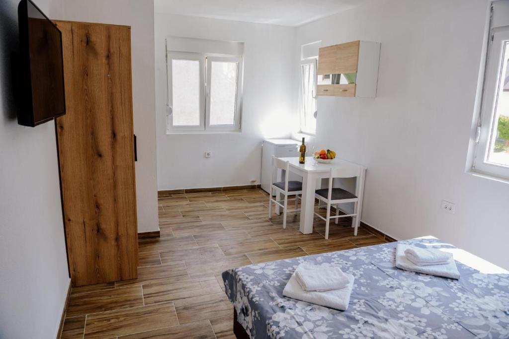 Postel nebo postele na pokoji v ubytování Premium Apartments