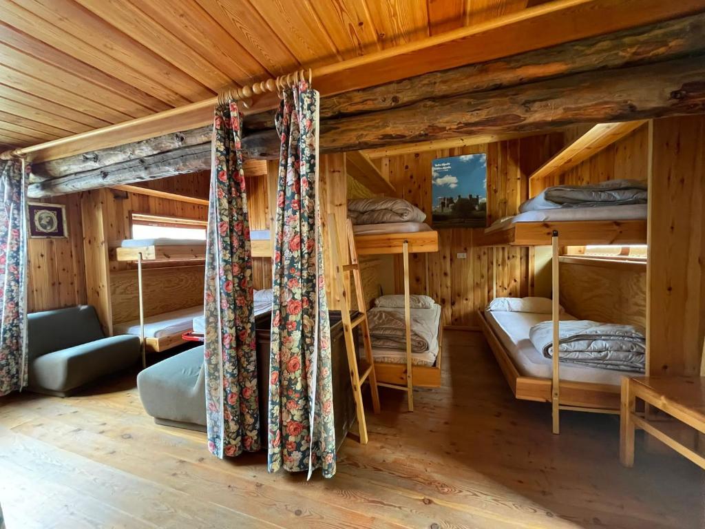 Postel nebo postele na pokoji v ubytování Rifugio Guide Frachey