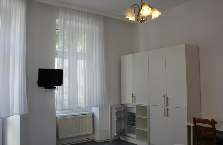 TV a/nebo společenská místnost v ubytování Arnes Hotel Vienna