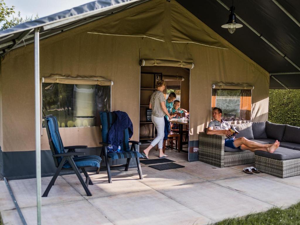 Nice safari tent on a holiday park near beach, Fornells ...