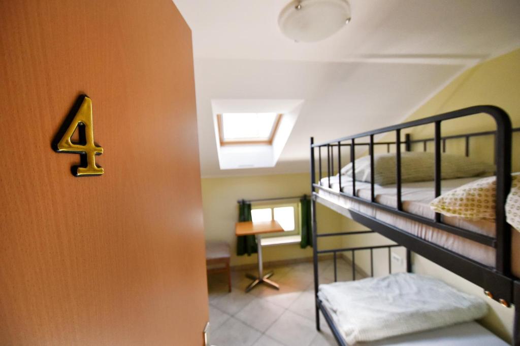 Letto o letti in una camera di Hostel X Point