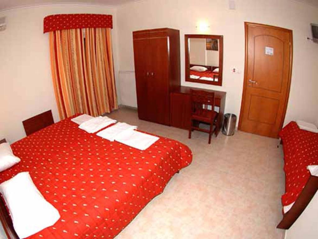 Postel nebo postele na pokoji v ubytování Hotel Souita