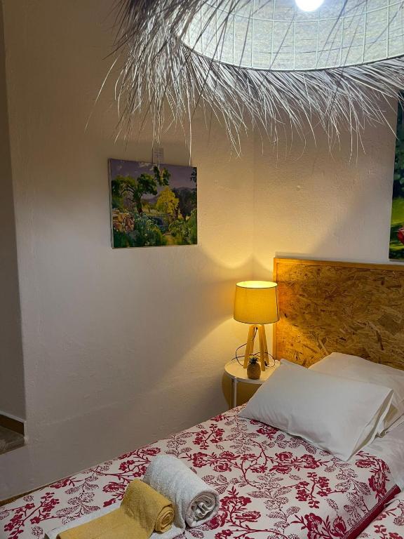Cama ou camas em um quarto em Casarão AL