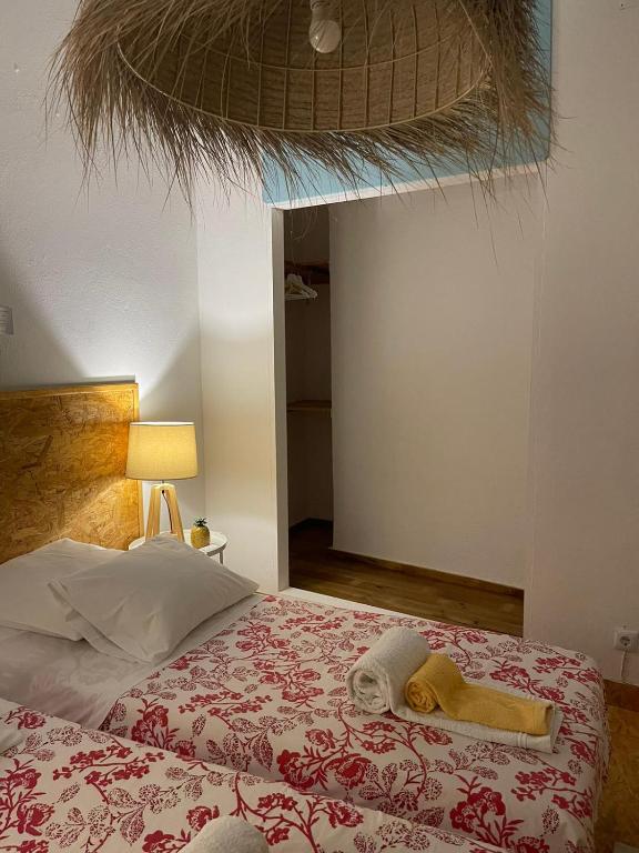 Cama ou camas em um quarto em Casarão AL