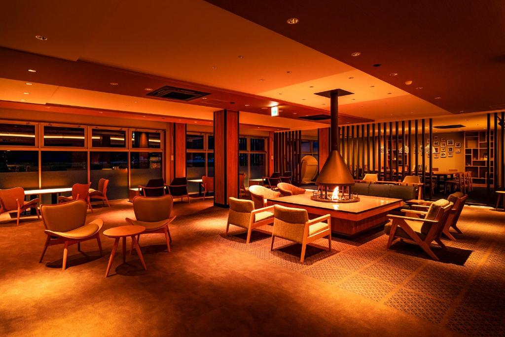 Posezení v ubytování Ooedo Onsen Monogatari Premium Kinosaki