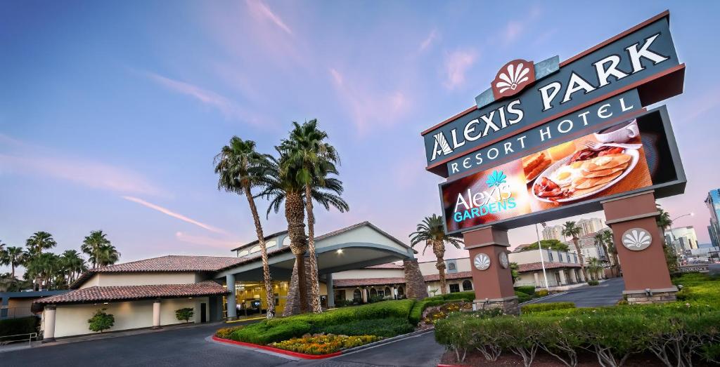 a sign for a las vegas park resort hotel at Alexis Park All Suite Resort in Las Vegas