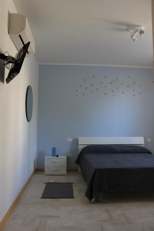 Posteľ alebo postele v izbe v ubytovaní Casa Chiarenza
