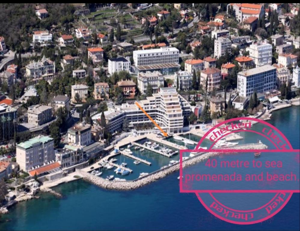 an aerial view of a city with a marina at Romeo&amp;Juliet in Opatija