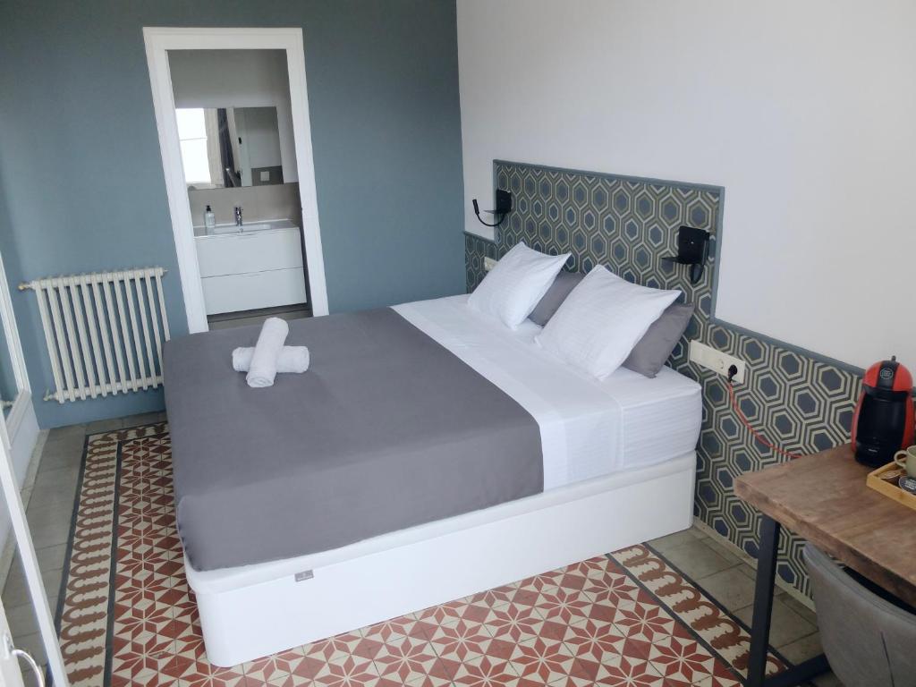 Cama ou camas em um quarto em Fabrizzio's Petit