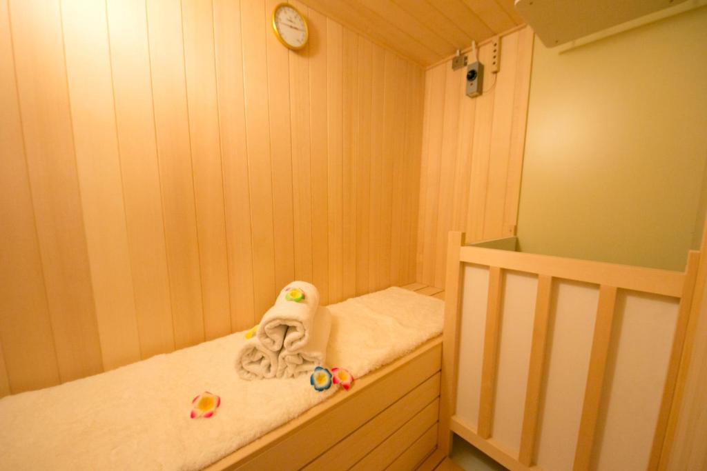 Postel nebo postele na pokoji v ubytování Grand Park Hotel Panex Chiba