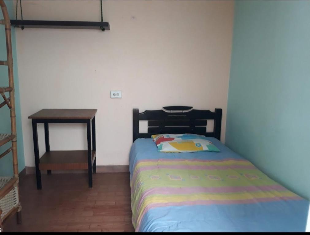 Postel nebo postele na pokoji v ubytování Casa 2600