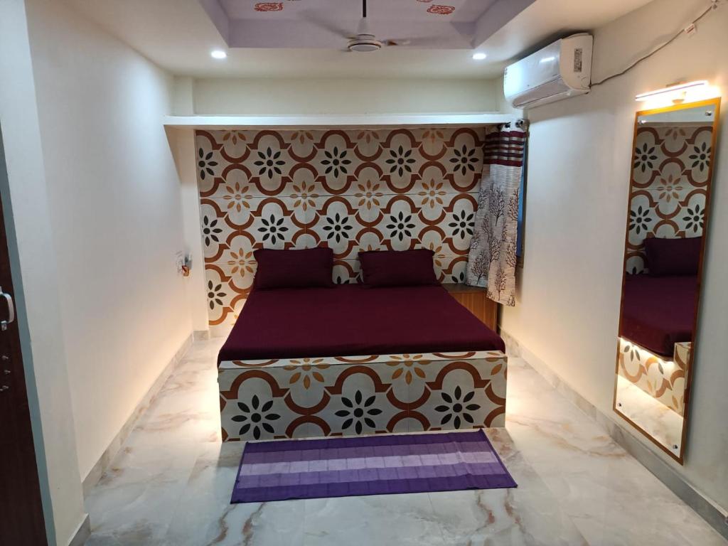 Ένα ή περισσότερα κρεβάτια σε δωμάτιο στο Hotel HCB (Hemo Chandra Bhawan)