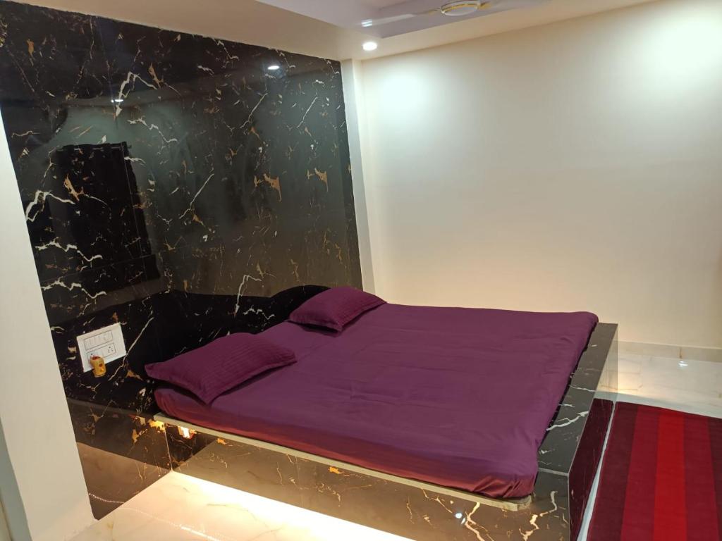 Postel nebo postele na pokoji v ubytování Hotel HCB (Hemo Chandra Bhawan)