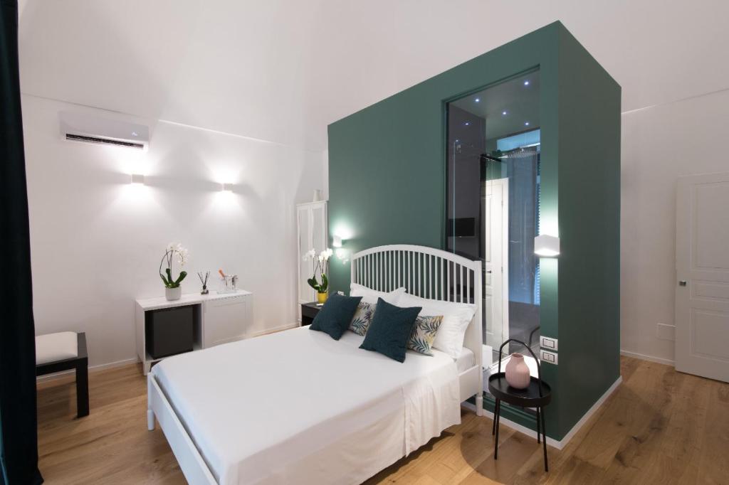 Uma cama ou camas num quarto em I Colori della Puglia Rooms