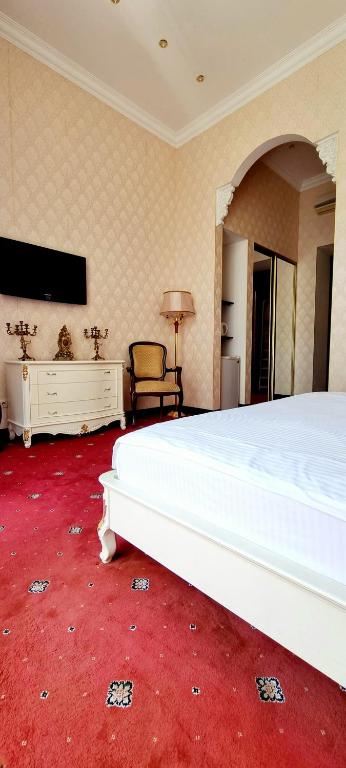 Postel nebo postele na pokoji v ubytování Oreanda Hotel