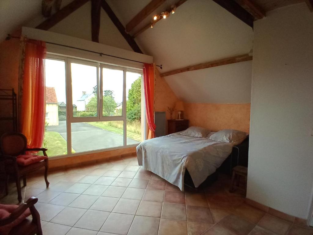 Posteľ alebo postele v izbe v ubytovaní Domaine Normence en Baie du Mont St Michel