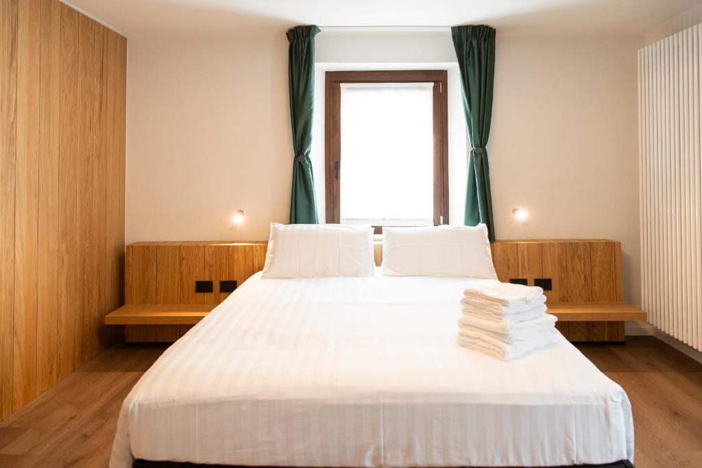 Postel nebo postele na pokoji v ubytování Hotel SALEI