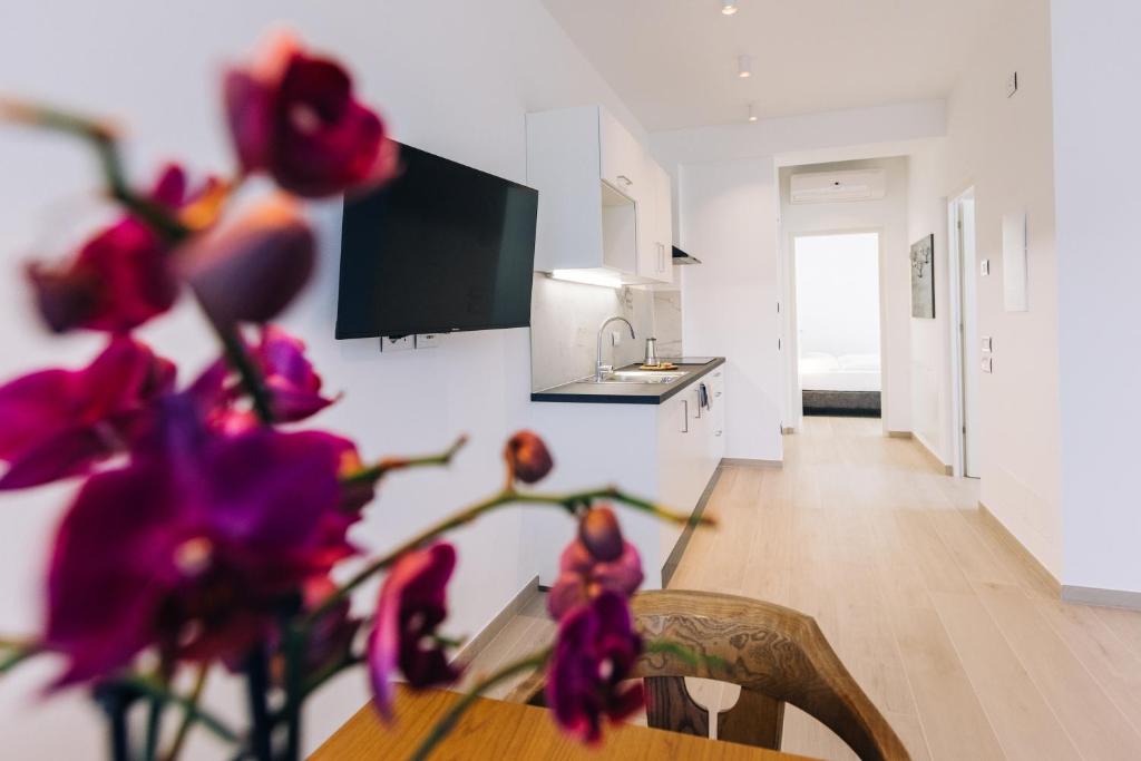 TV a/nebo společenská místnost v ubytování Residence Martinelli