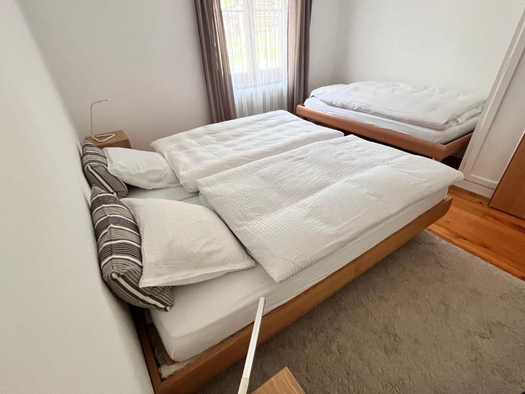 Postel nebo postele na pokoji v ubytování apartment Alpenrose