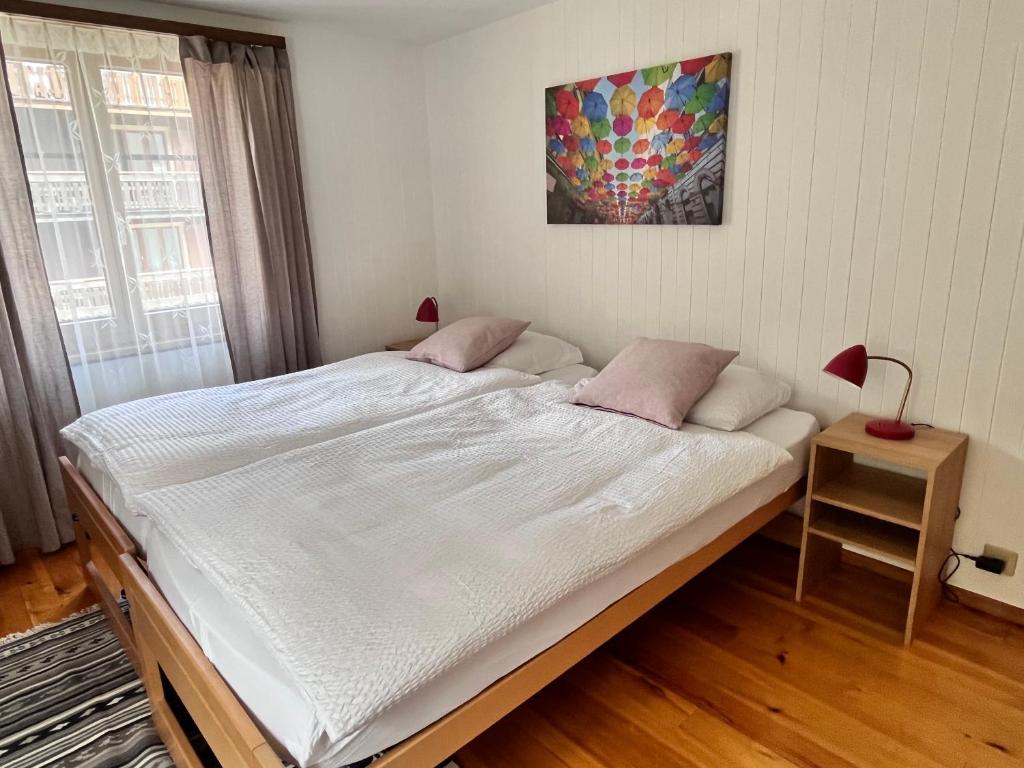 Postel nebo postele na pokoji v ubytování apartment Alpenrose