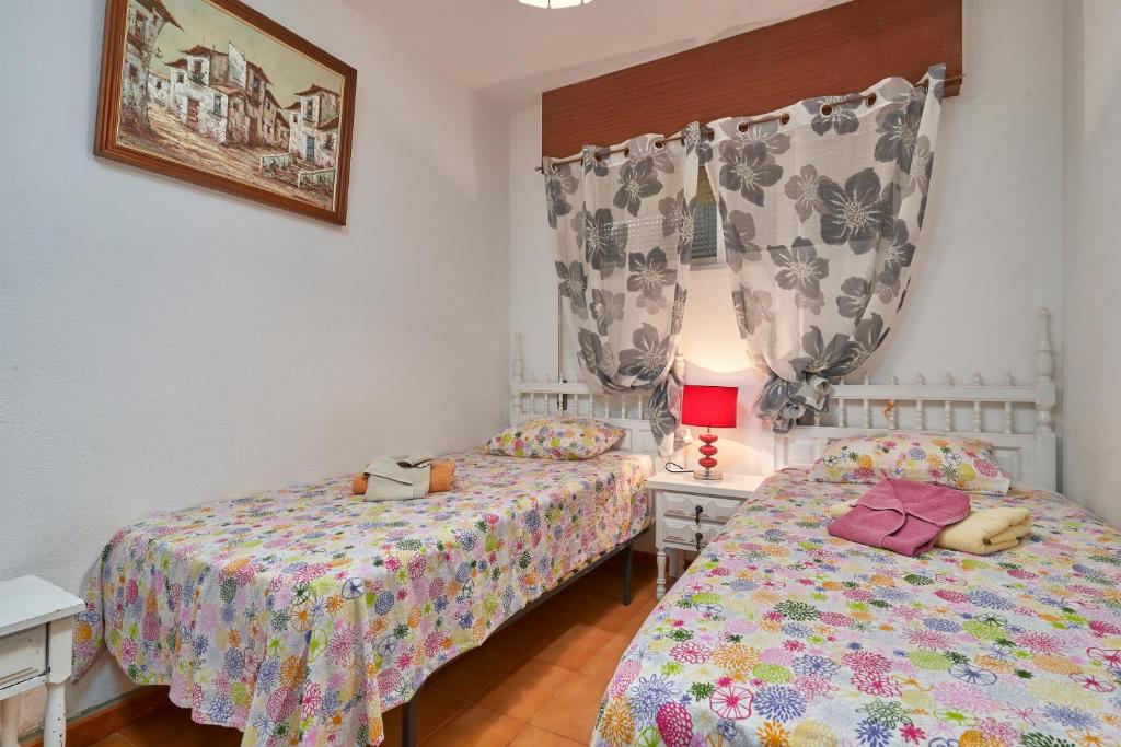 Posteľ alebo postele v izbe v ubytovaní Epsilon 2 4f primera línea de playa