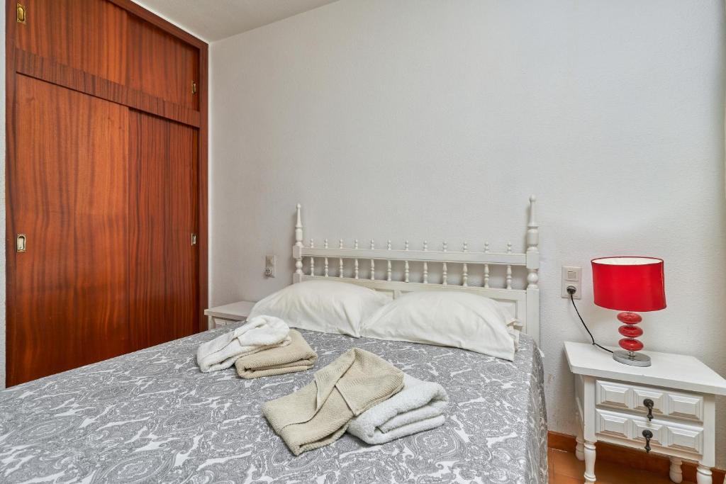 Posteľ alebo postele v izbe v ubytovaní Epsilon 2 4f primera línea de playa