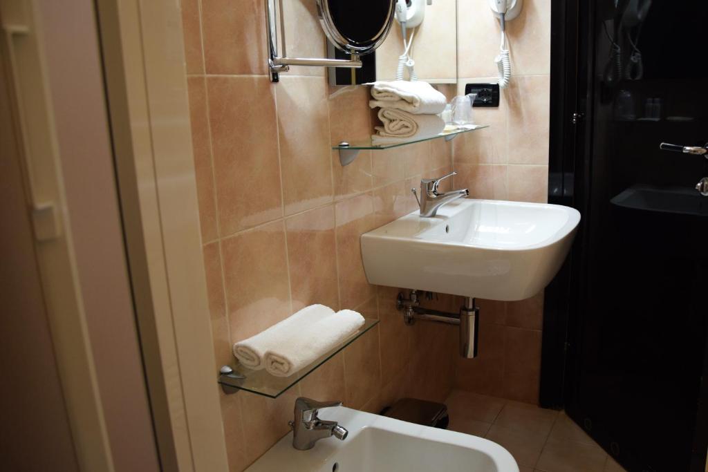 Koupelna v ubytování Hotel Valentino Du Parc