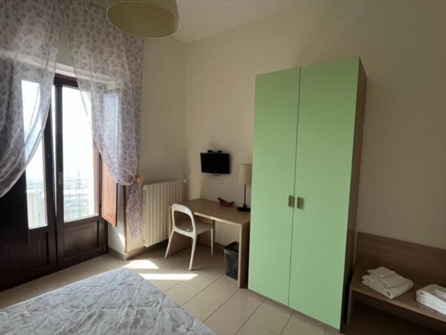 Postel nebo postele na pokoji v ubytování B&B Casa Miraglia