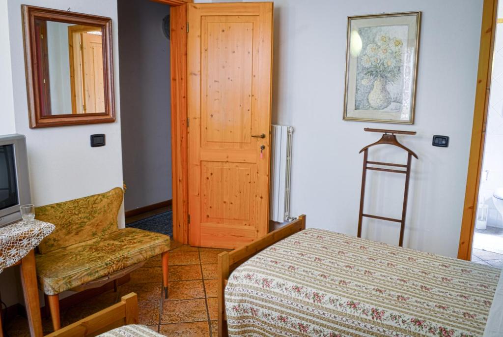 Łóżko lub łóżka w pokoju w obiekcie Bed & Breakfast Il Giardino