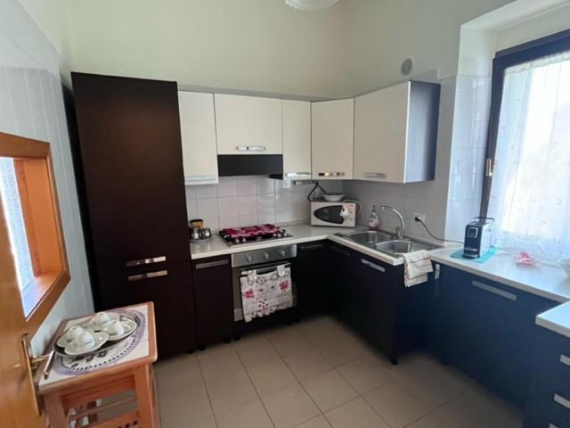 Kuchyň nebo kuchyňský kout v ubytování B&B Casa Miraglia