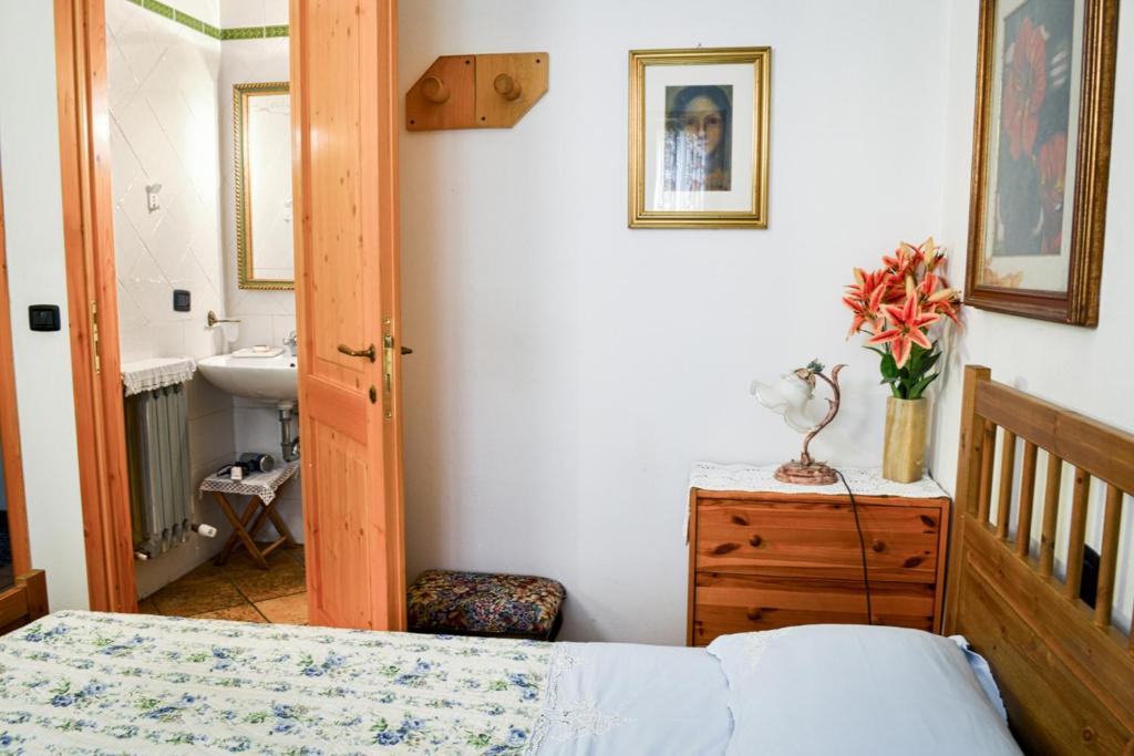 Łóżko lub łóżka w pokoju w obiekcie Bed & Breakfast Il Giardino