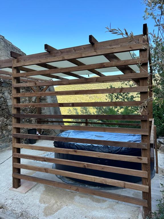 a wooden fence with a mattress in it at Maison Amandre en Pleine Nature - Mas Lou Castanea in Collobrières