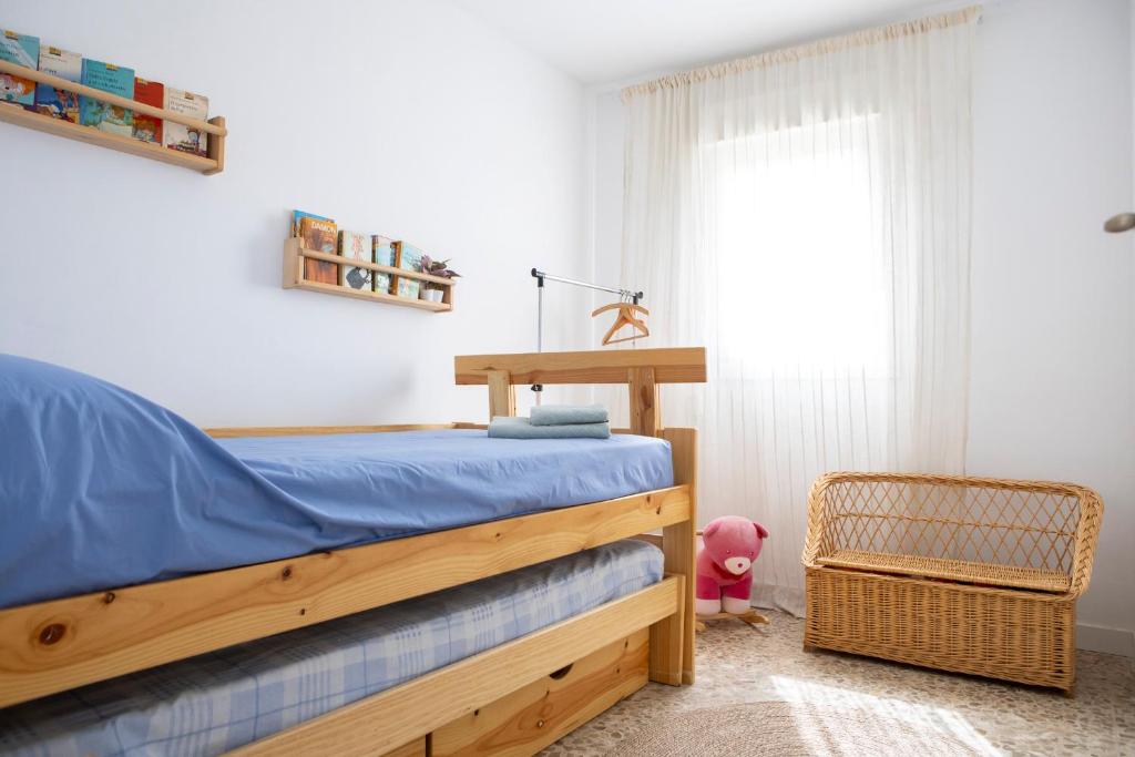 Posteľ alebo postele v izbe v ubytovaní Apartamento Málaga El Faro