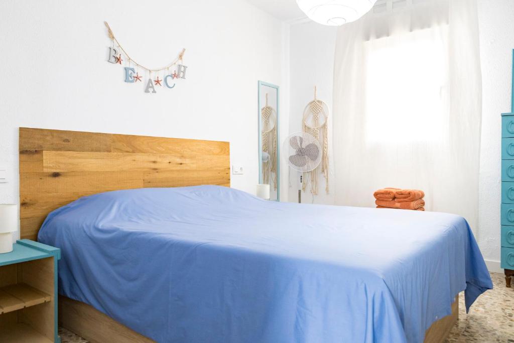 Posteľ alebo postele v izbe v ubytovaní Apartamento Málaga El Faro