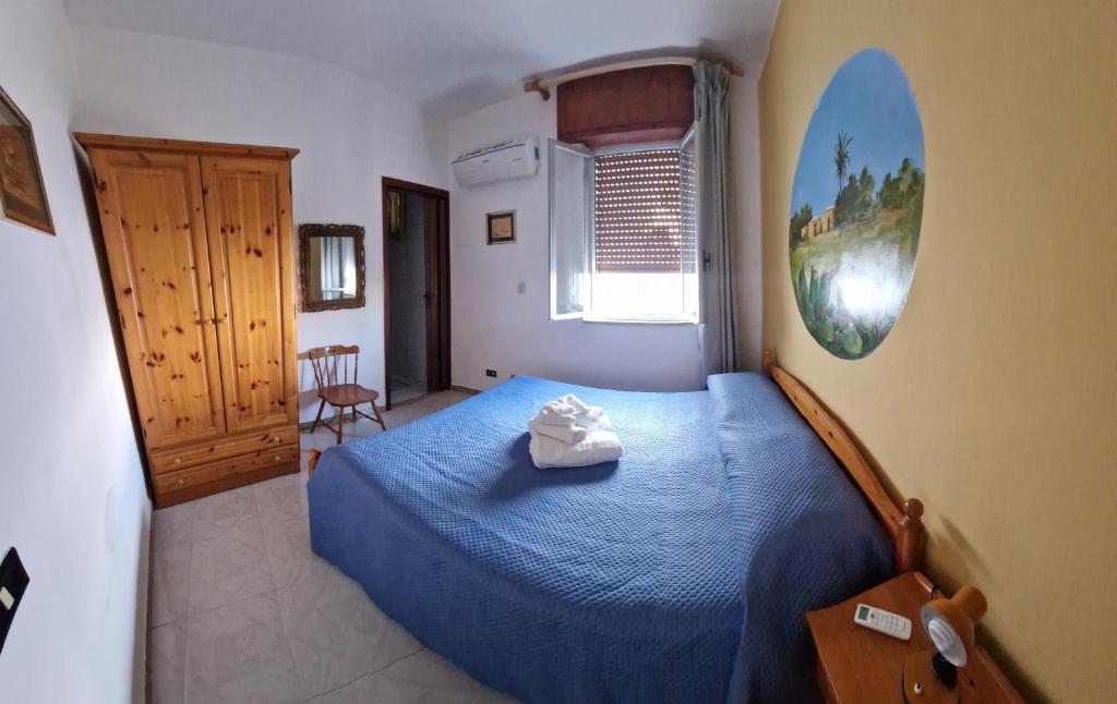 A bed or beds in a room at Case Pescatori