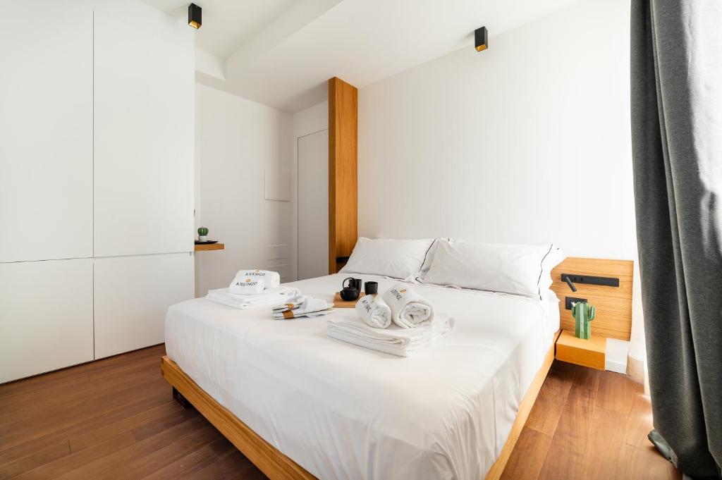 Postel nebo postele na pokoji v ubytování Arringo - Stay comfy